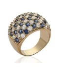 Grosse bague plaqué or pavage de zirconium blanc et saphir en demi jonc